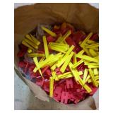 Paper Grocery Bag of Random Tile Leveling Clips