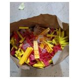 Paper Grocery Bag of Random Tile Leveling Clips
