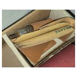 Assorted Sandpaper and Woodworking Supplies