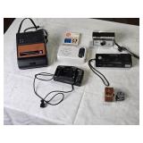 Collection of Vintage Instant and Film Cameras with Accessories