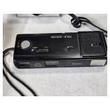 Collection of Vintage Instant and Film Cameras with Accessories