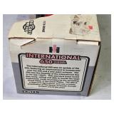 ERTL International 650 Diesel Tractor Model - 1/16 Scale Die-Cast Metal