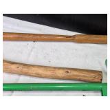 Collection of Gardening Tools Including Weed Cutter, Pruning Shears, and Hand Tools