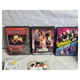 Mixed Lot of Holiday Items - DVDs, Lights, Photo Camera, and Decorations