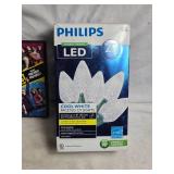 Mixed Lot of Holiday Items - DVDs, Lights, Photo Camera, and Decorations