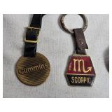 Collection of Various Key Chains and Belt Buckle