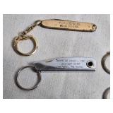 Various Keychains and Other Advertising Items