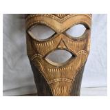 Hand-Carved African Mask with Intricate Designs