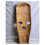 Hand-Carved African Mask with Intricate Designs
