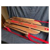 Beautifully Restored Red Metal and Wood Snow Sled with Rope Handle