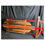 Beautifully Restored Red Metal and Wood Snow Sled with Rope Handle