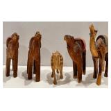 Collection of Four Wooden Camel Figurines