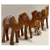 Collection of Four Wooden Camel Figurines