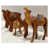 Collection of Four Wooden Camel Figurines