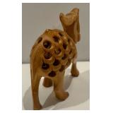 Collection of Four Wooden Camel Figurines