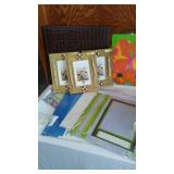 Assorted Decorative Frames, Scrapbooking Supplies, and Baskets
