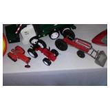 Vintage and Newer Toy Collection Including Tootsie Tractors, Spinning Tops and More.