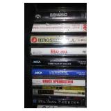 Collection of Vintage Music Cassette Tapes in Carry Case