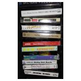 Collection of Vintage Music Cassette Tapes in Carry Case