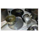 Assorted Cookware Collection including Pots, Pans, and Kettles