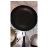 Assorted Cookware Collection including Pots, Pans, and Kettles