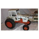 Case Metal Tractor, Tru Scale Square Baler, and Gambles Truck.