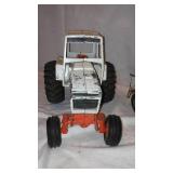 Case Metal Tractor, Tru Scale Square Baler, and Gambles Truck.