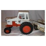 Case Metal Tractor, Tru Scale Square Baler, and Gambles Truck.