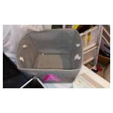 Storage containers and Laundry Basket.