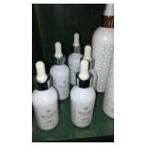 Young Living Thieves Household Cleaner and Sakred.