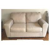 Neutral Colored Upholstered Loveseat / Sofa