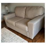 Neutral Colored Upholstered Loveseat / Sofa