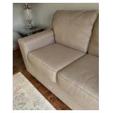 Neutral Colored Upholstered Loveseat / Sofa