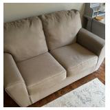 Neutral Colored Upholstered Loveseat / Sofa