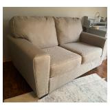Neutral Colored Upholstered Loveseat / Sofa
