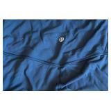 Three Pairs of Lulu Lemon Leggings in Navy, Black and Black with White & Blue Stripes