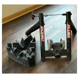 Two Bicycle Trainers by Cycle Ops and Sonic Fluid