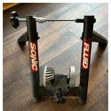 Two Bicycle Trainers by Cycle Ops and Sonic Fluid