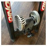 Two Bicycle Trainers by Cycle Ops and Sonic Fluid