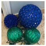 Four Blue and Green Light Up Balls