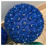 Four Blue and Green Light Up Balls