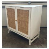 White Cabinet with Rattan Accents