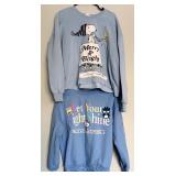 Two Blue Sweatshirts Including Peanuts and Hello Kitty