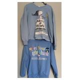 Two Blue Sweatshirts Including Peanuts and Hello Kitty