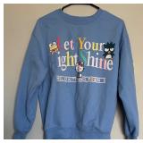 Two Blue Sweatshirts Including Peanuts and Hello Kitty
