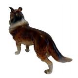 Three Collectible Dog Figurines