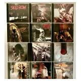 Collection of 12 Rock Music CDs including Skid Row, SXen, and Tesla