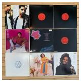 Collection of 8 Vinyl Records from Various Artists including Anita Baker