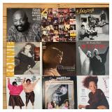 Collection of 9 Vinyl Record Albums with Mixed Genres including Isaac Hayes