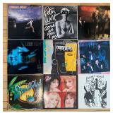 Collection of 9 Vintage Vinyl Records from Various Artists including Peter Murphy